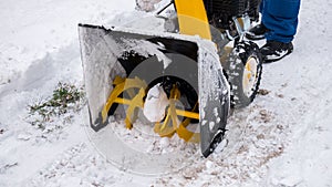 Close-up of the snowthrower ready for cleaning the snow in the winter after a snowstorm