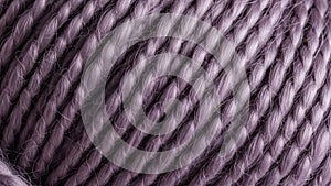 Close up of soft purple yarn texture for knitting and crafting projects