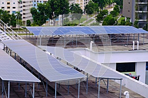 Close up of solar panels installed on roof tops of HDB blocks in Singapore to harness green energy the aim to being carbon-