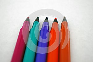 A close up of some different colours Felt tip pens