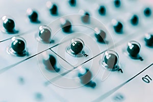 Close up of a sound mixer control panel in a recording studio