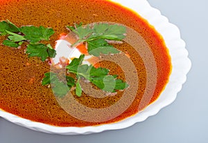 Close-up soup from beet with sour cream