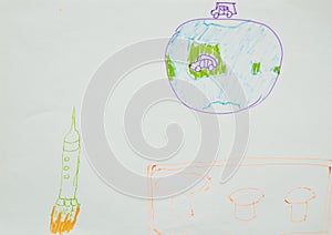 Close up. A spaceship flies in space, planet Earth. Child`s drawing. Creative activities with children 4-5 years old
