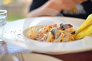 spaghetti on white plate in resterant