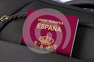 Close up of Spaine Passport in Black Suitcase Pocket