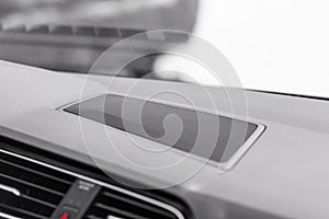 Close up speaker in car.