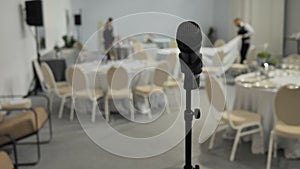 Close-up speaker microphone for conference speech blurred background