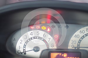 Close-up on speedometer in dashboard car. Speed gauge meter. Travel abstract concept idea background