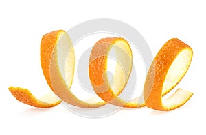 Close-up of spiral orange peel isolated on white background. Citrus fruit