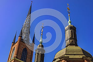 Close up of the spire and towers of the Riddarholmen Church in Stockholm Sweden