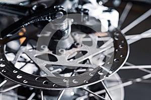 Close-up of a spoke wheel. Macro photo. Part of the bike.