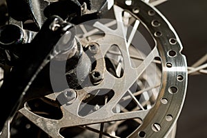 Close-up of a spoke wheel. Macro photo. Part of the bike.