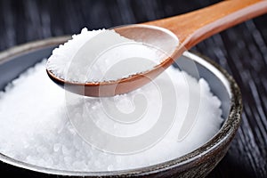 close-up of a spoonful of iodized salt, a key mineral for thyroid health