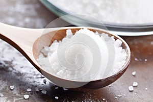 close-up of a spoonful of iodized salt, a key mineral for thyroid health