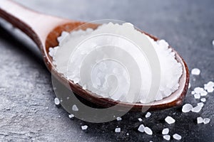 close-up of a spoonful of iodized salt, a key mineral for thyroid health