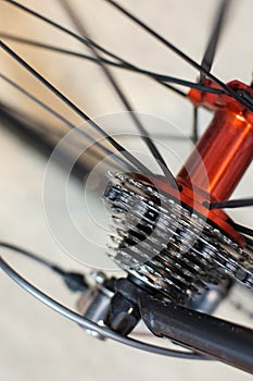 Racing bicycle rear axle with racing cassette gears