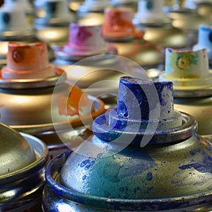 Close up of spray paint cans