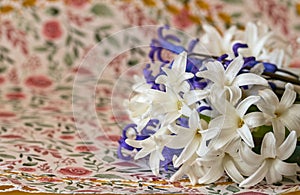 Close-up of spring hyacinth on patternedbackground