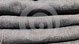 Close up of stack of blue jeans