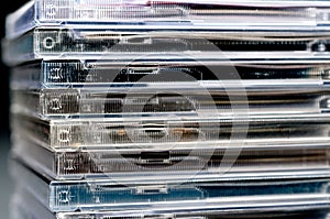 A close up of a stack of CDs