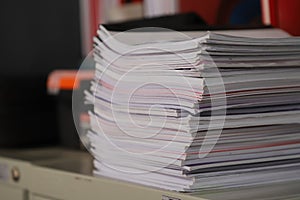 Close-Up of a Stack of Documents on an Office Desk