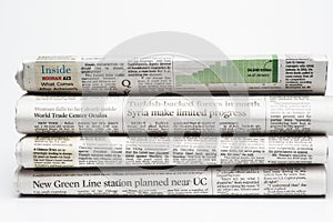 Close up of a stack of folded newspapers