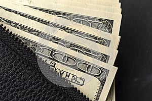 Close-up of a stack of hundred-dollar bills