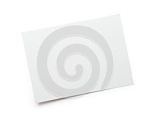 Close up of stack of mockup white papers letter isolated clipping mask on white background with path, top view photo