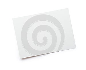 Close up of stack of mockup white papers letter isolated clipping mask on white background with path, top view