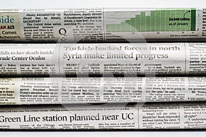 Close up of a stack of newspapers