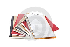Close up stack of notebook isolated on white