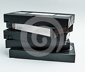 Close up of a stack of an old videotapes.