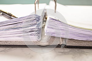 Close up - Stack paper file in the files folder of business