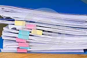 Close up Stack of papers files piles with documents achieves with paper clips