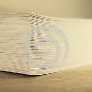 Close up of stack of papers on white background. Office: Pile of Paper