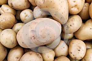 Stack of potatoes on a market stall