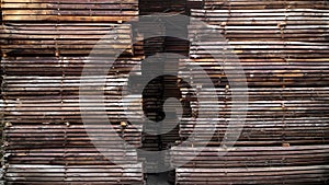 Texture of a stack of wooden planks