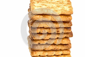 Close up stacked of crackers on white background