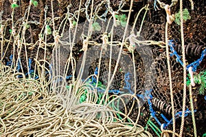 Close-up of stacked fishing cage traps