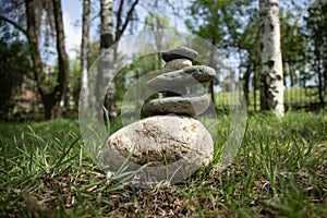 Close-up of stacked pebbles in forest