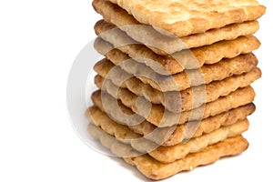 Close up stacked sugar crackers biscuit on white background