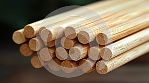 Close-up of stacked wooden chopsticks, blurred background
