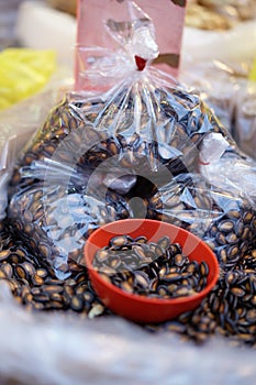 Close-up of Stall selling Melon seeds for sale in China town