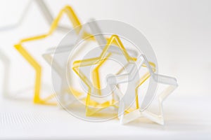 Close up star shaped pastry cutter on a white background