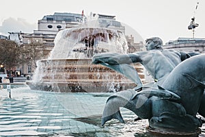 Close up of a statue and fountain on Trafalgar Square,London, UK