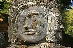 Close up of statue, Victory gate bridge, Angkor Thom