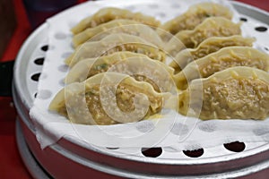 Close up steamed Korean dumplings served at a restaurant