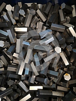 Close up steel hexagon used for various industries. raw material, texture background