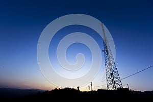 Close-up steel structure. communication antennas with blue sky background.