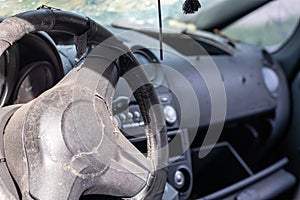 Close-up of the steering wheel of a car after an accident. The driver\'s airbags did photo